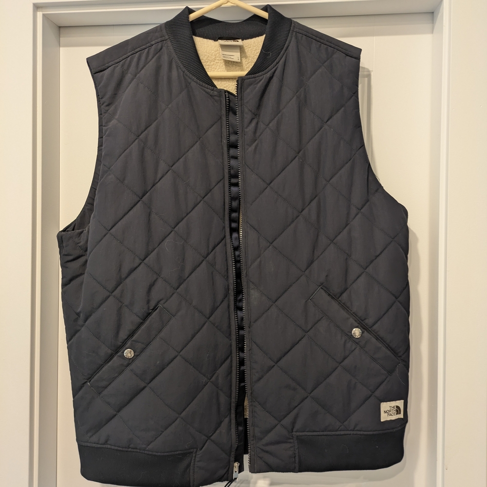 The North Face Black Quilted Vest with Stand-Up Collar